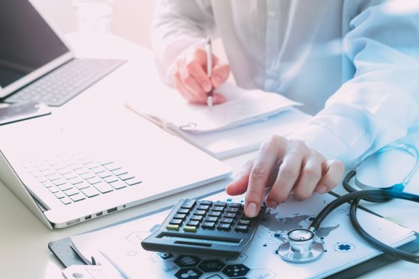 Healthcare,Costs,And,Fees,Concept.hand,Of,Smart,Doctor,Used,A
